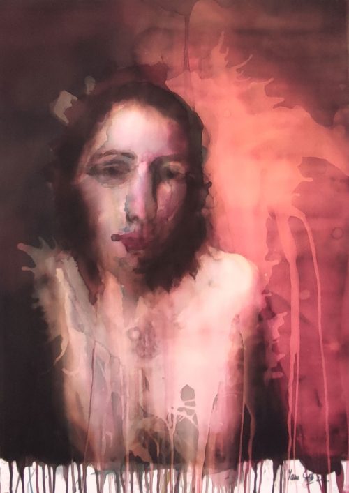 Portrait d'une femme et éclaboussure à l'encre sur papier